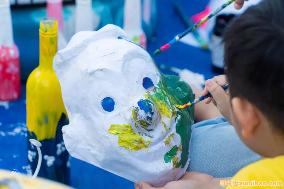 Children engaging in a creative DIY mask painting session, full of colors and creativity.